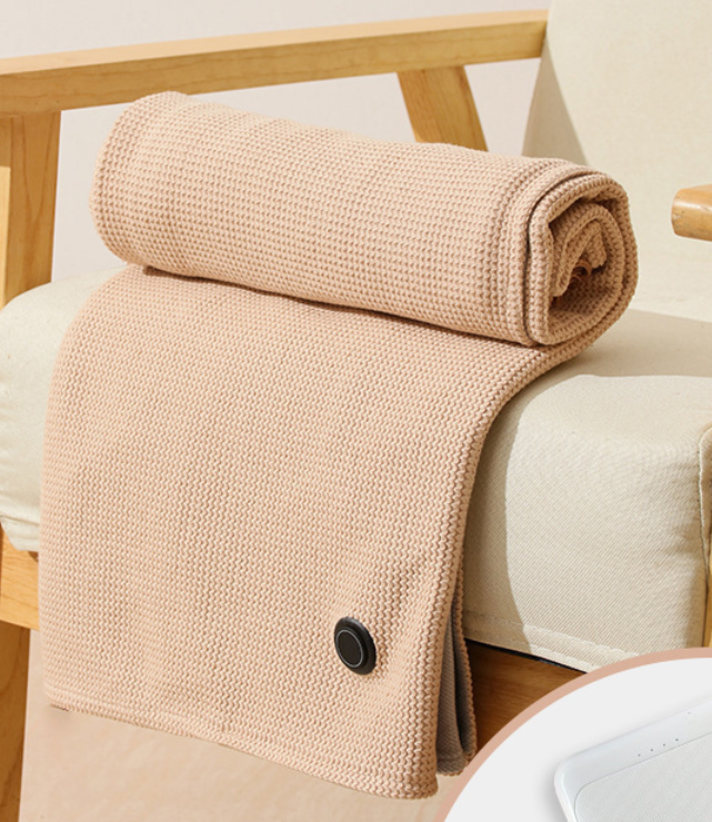 Heated shawl blanket. Perfect for office, car, and outdoor warmth.